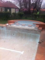 Concrete swimming pool finished in Blue Mist