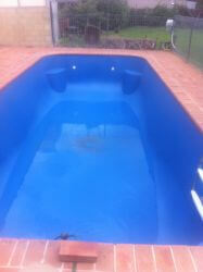 Fibreglass pool finished in Pacific Blue
