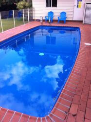 Fibreglass pool finished in Pacific Blue
